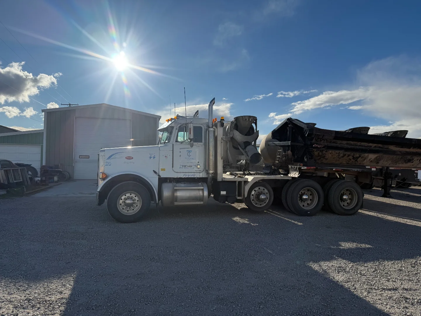 Titan Concrete truck and side-dump trailer ready for material hauling